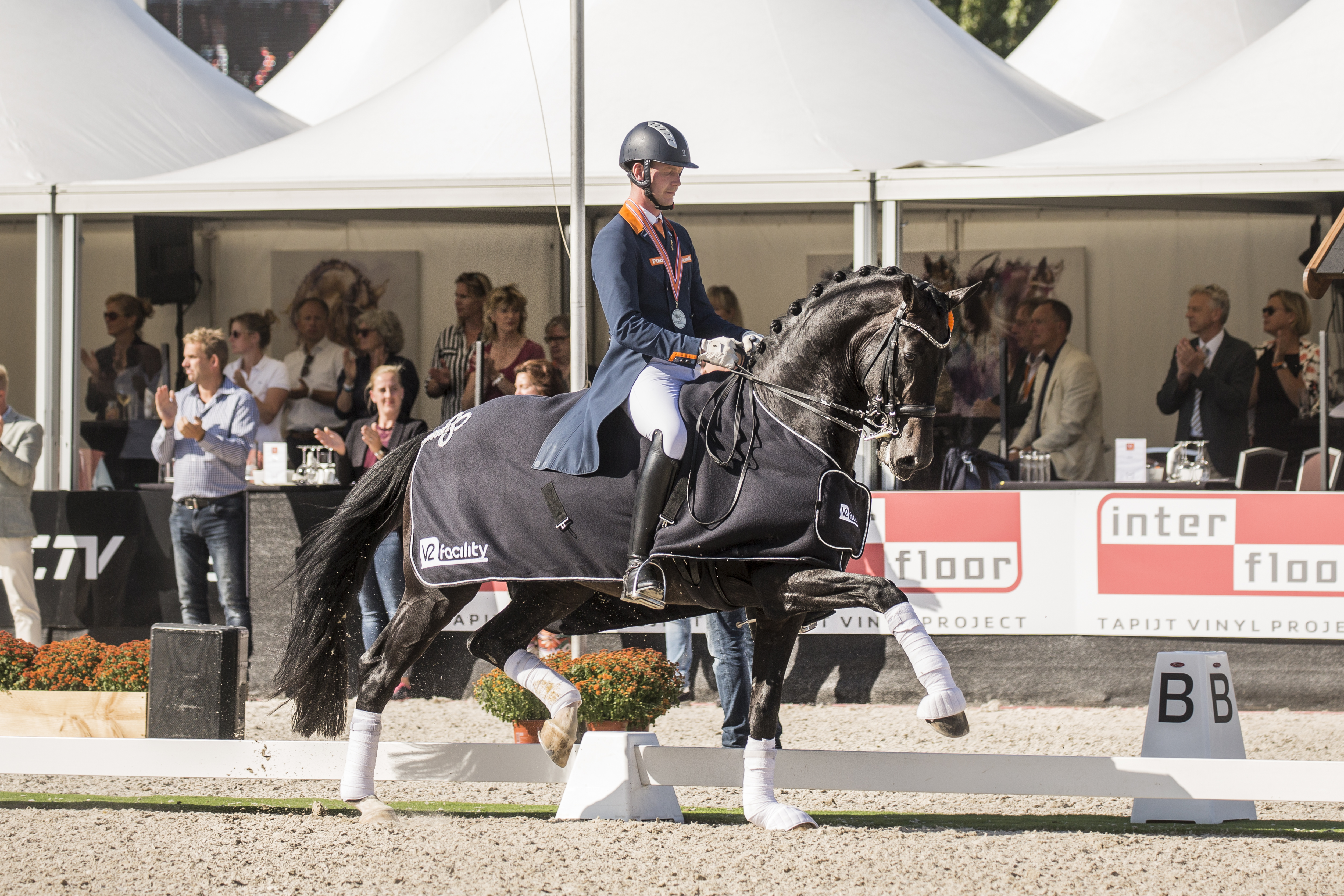 Impression en Diederik tijdens de ereronde NK-Dressuur